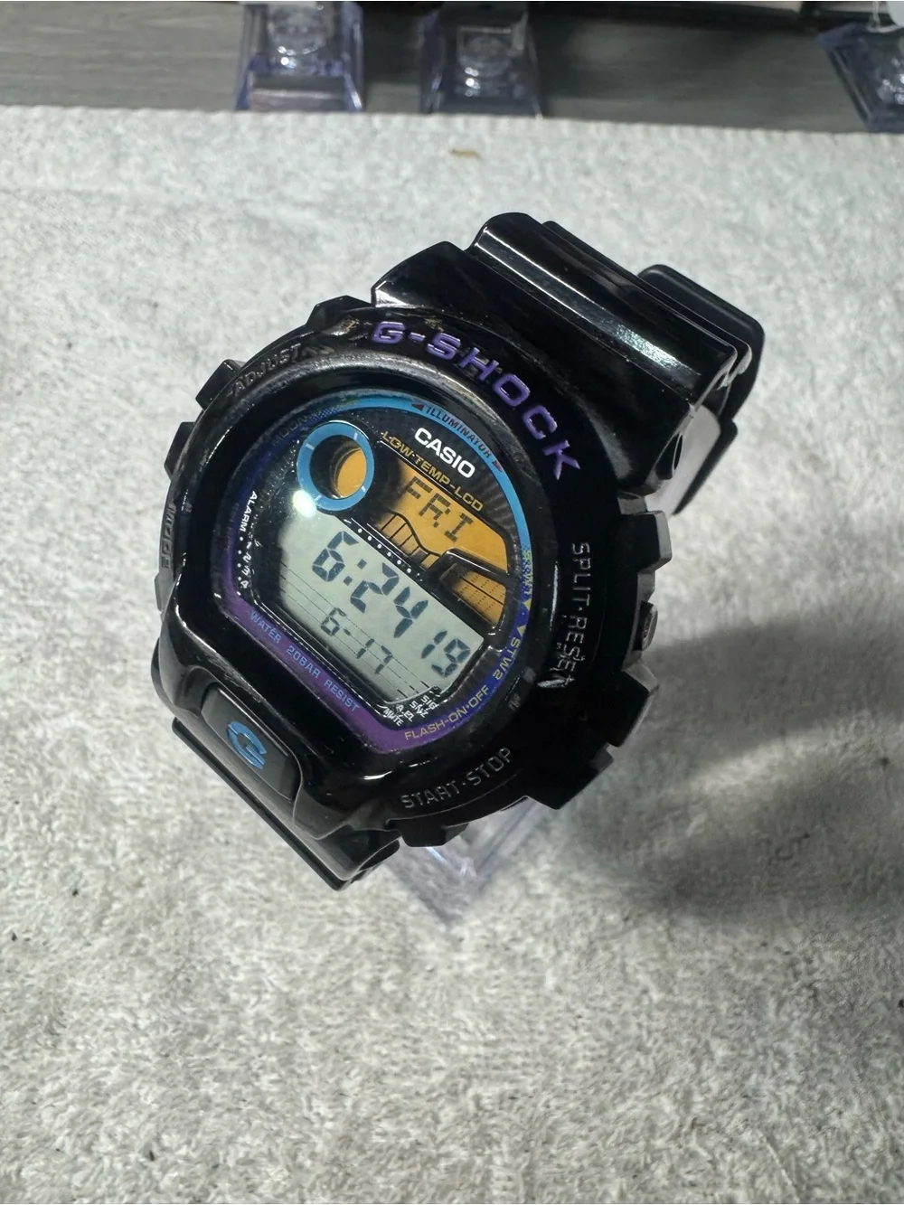 Casio Black G-Shock Watch with Blue and Purple Accents